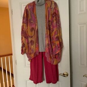 mid-calf crepe slacks, silver sleeveless turtleneck, print flowing sleeve blouse